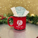 Red cup-shaped container with a skincare product on a dark surface